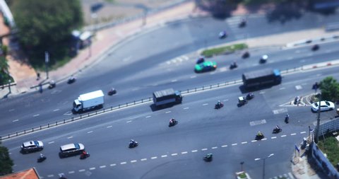 A traffic jam at the miniature busy town high angle tiltshift. Ho Chi Minh / Vietnam - 02.25.2020