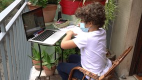 Europe, Asia and America ( USA )  close schools and universities due to covid19 coronavirus epidemic - children boy in quarantine home with computer during school lesson at home - lockdown