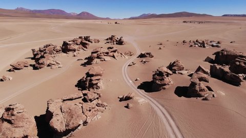 Flying over the desert rocks in the Atacama - Bolivian altiplano