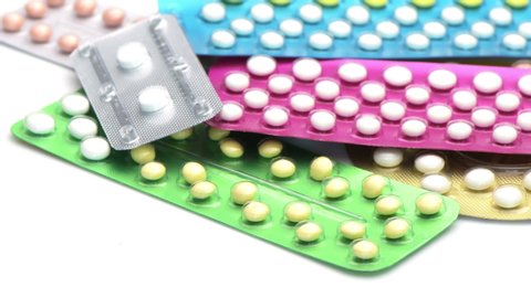 Colorful strips of oral contraceptive pill.
