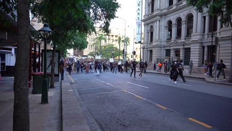 Brisbane, Australia - June 06, 2020: Thousands of people gather in city streets against police brutality and the senseless murder of George Floyd by the Minneapolis police department. 