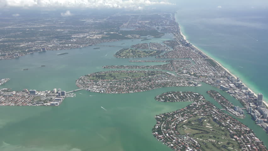 Miami, Florida Atlantic coastline seen from high altitude in 4K
