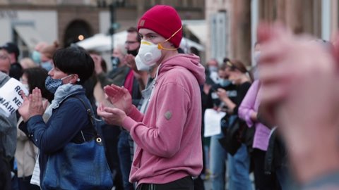 Expression opinion mass event. Teenager in respirator participates in public event in public place. Idiological effect mass consciousness on people. There is no certainty. CZ, Prague, 9.6.2020 
