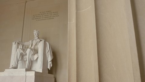 WASHINGTON, DC - NOVEMBER 2016: Dolly shot of Abraham Lincoln statue inside Lincoln Memorial, built to honor the 16th President of the United States of America, Washington DC, USA
