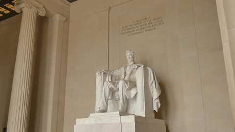 WASHINGTON, DC - NOVEMBER 2016: Dolly shot of Abraham Lincoln statue inside Lincoln Memorial in Washington DC, USA
