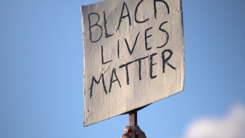 Black Lives Matter Board Held At Protest Rally, 4K.
