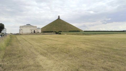 Aerial of the Lion's mound around arable land and next to the museum of Waterloo. Location where Napoleon suffers defeat in 1815, bringing an end to the Napoleonic era of European history.