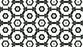 Animation of monochromatic design of hexagons arranged symmetrically in rows and revolving, on white background. Seamless loop. Motion graphics.VJ loops.
