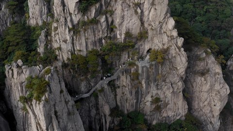People on Yellow Mountain walkway, Huangshan Anhui province China, lowering aerial view