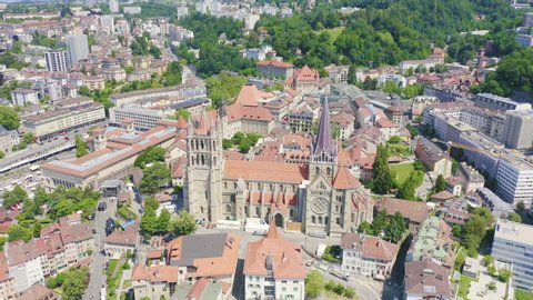 Dolly zoom. Lausanne, Switzerland. Cathedral of Lausanne. La Cite is a district historical centre, Aerial View, Departure of the camera
