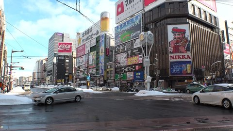 SAPPORO, HOKKAIDO, JAPAN - FEB 2020 : Scenery of Susukino downtown area in day time. Japan's largest entertainment district north of Tokyo. Famous place for shopping, nightlife and red light district.