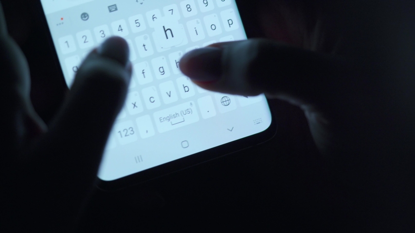 Hands typing text on smartphone close-up. Using smartphone close up at night. | Shutterstock HD Video #1054351247