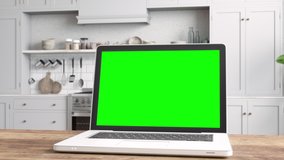 3d Rendering of Laptop with Green Screen On Table With Kitchen Backgrounds 