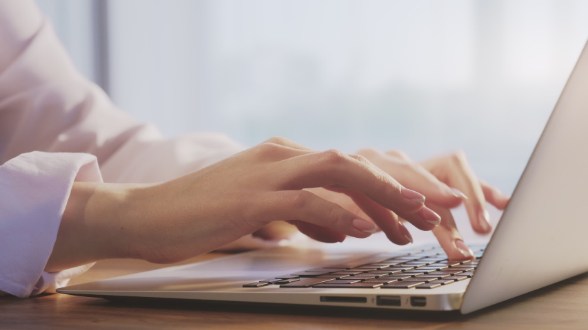 Freelance work. Home office. Business woman hands typing on modern laptop. | Shutterstock HD Video #1054358483