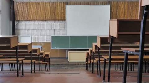  Empty Auditorium With Wooden Desks And Chairs 