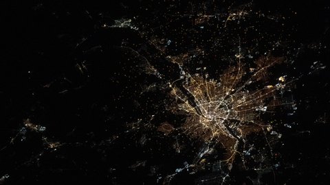 City at night satellite aerial view animation of Budapest Hungary capital. Images furnished by Nasa