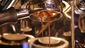 Close up slowmaton of Pouring coffee stream from professional machine , Crema Espresso Perfect Shot from coffee maker machine - Powered by Shutterstock - Get 15% off with code: PIKWIZARD15