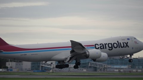 NOVOSIBIRSK, RUSSIAN FEDERATION - JUNE 10, 2020: Cargolux Boeing 747-8F LX-VCN Freighter Jet Airplane Landing at OVB Tolmachevo International Airport Arriving from Luxembourg on a cloudy morning