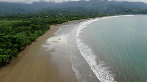Beautiful cinematic aerial footage of the Whale Tale beach in the Marino Ballena National Park in Costa Rica