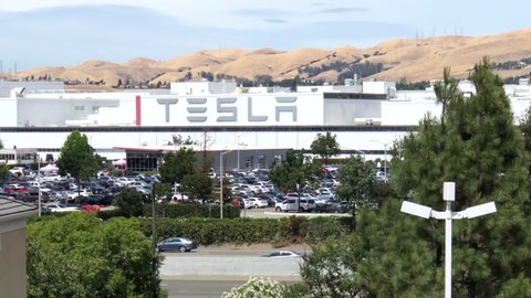 Fremont, CA - June 15, 2020: 4K HD video zooming in on Tesla’s factory in Fremont, California, one of the world’s most advanced automotive plants with more than 10,000 employees
