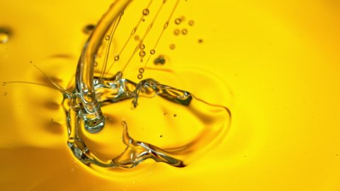 Super Slow Motion Shot of Pouring Golden Oil Liquid at 1000fps.