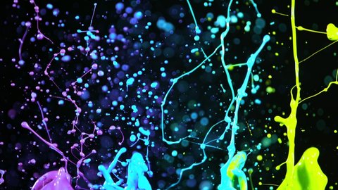 Colorful splashing paint in super slow motion. Shooted with high speed cinema camera