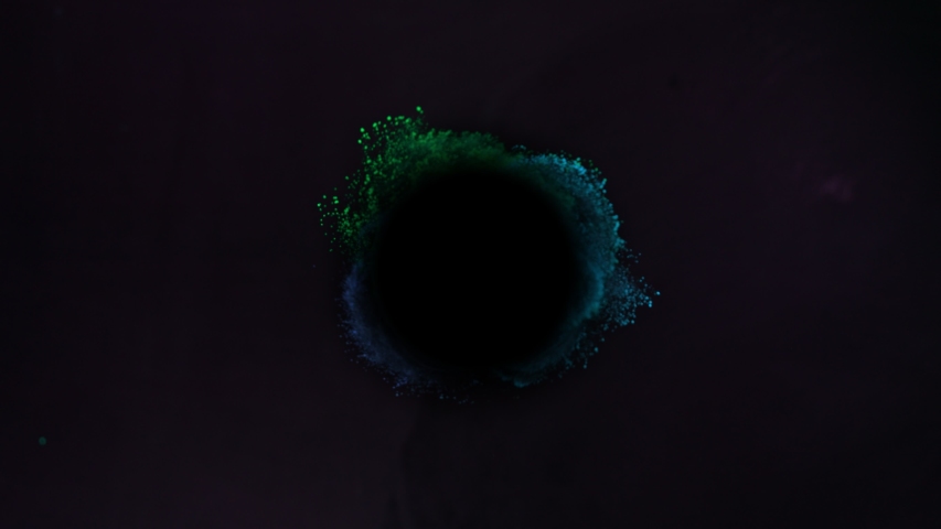Super Slow Motion Shot of Color Powder Vortex Isolated on Black Background  Royalty-Free Stock Footage #1054401353
