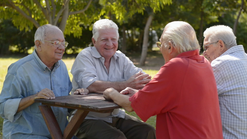 Active retired senior people and leisure, authentic old friends and free time, elderly men having fun, talking, smiling outdoors in urban city park Royalty-Free Stock Footage #1054404107