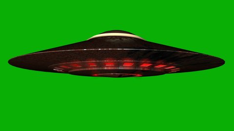 Realistic UFO With Green Screen Background. UFO, rotating alien spaceship, flying saucer isolated on green screen background,