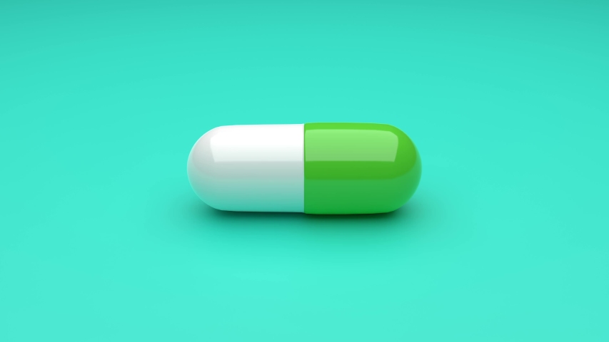 Video Stok white-green pills isolated rotating on green (100% Tanpa Royalti...
