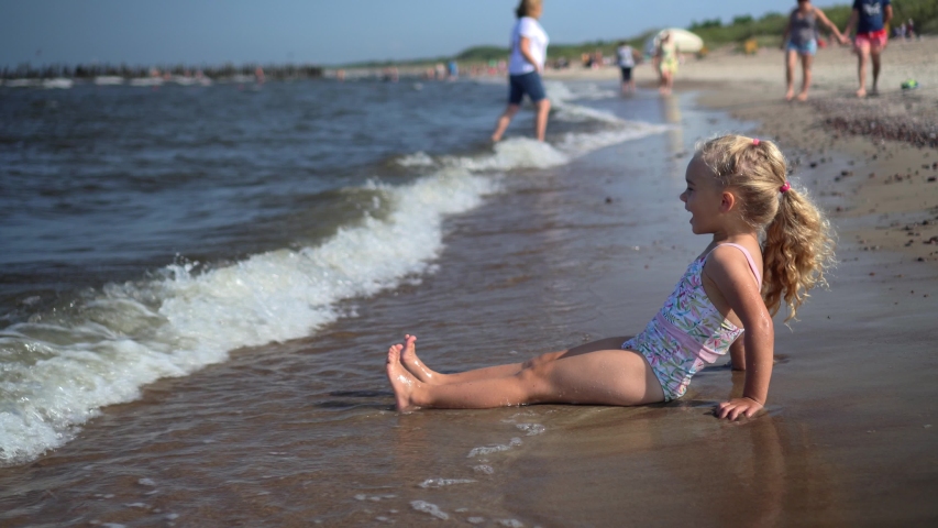 boy leg swimsuit by sea waves