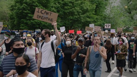 New York, NY / USA - June 2020: Black Lives Matter protest and march in NYC - Peaceful protestors, handwritten signs, huge crowds