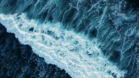 Drone view of tidal waves splashing and rolling