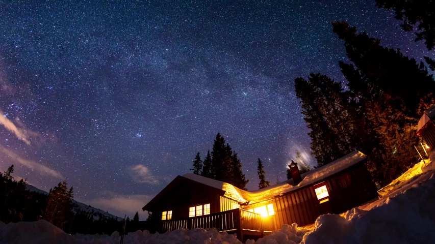 Log cabin night sky stars time lapse