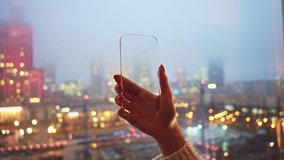 Female hand showing futuristic mock-up phone for animation. Closeup young woman using invisible smartphone interacting virtual reality. Future is now. - Powered by Shutterstock - Get 15% off with code: PIKWIZARD15