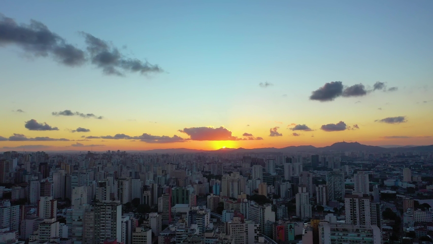 Aerial panorama of city life scene. Great cityscape view. Sao Paulo, Brazil. Skyline sunset. Sunset city. City life landscape. Sunset sky. Cityscape scenery. Colorful skyline. Dusk skyline. Sunset sky