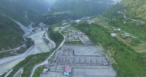 Aerial view of 300 megawatt Hydro electricity project in Himalaya  Ganges in India . 4k .