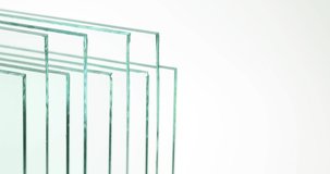 Sheets of Factory manufacturing tempered clear float glass panels cut to size - Powered by Shutterstock - Get 15% off with code: PIKWIZARD15