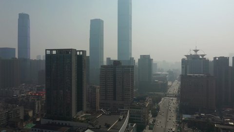 sunny day flight over changsha city downtown traffic street aerial panorama 4k china