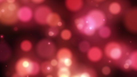 Vivid bokeh abstract motion graphic radiance elements. Round forms, flowing liquid shapes, shining particles. Red gradient color. Looped animation. 4K Ultra HD