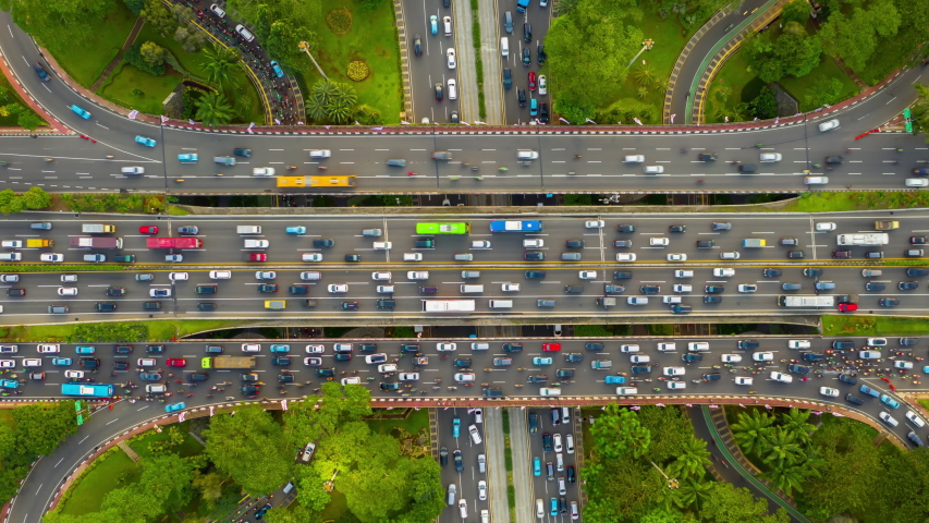 Jakarta city center sunny day busy traffic street road junction aerial topdown panorama 4k indonesia | Shutterstock HD Video #1054495010
