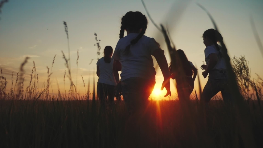 happy family. children kid together run in the park at sunset silhouette. people in park concept mom dad daughter and son joyful run. happy family and little baby child fun summer kid dream concept Royalty-Free Stock Footage #1054505354