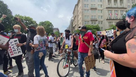 Washington, D.C. USA - June 6, 2020: Protesters gather for a Black Lives Matter demonstration in Washington, D.C. This was the largest gathering of protesters in the city since George Floyd's death.