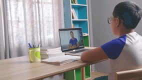 Asian Boy Learning With Video Call Conference
