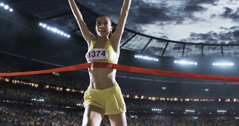 Track and field runner crosses finishing line on the professional sports arena. The woman is happy, smiling with arms raised. Arena and people on it are made in 3D and animated.