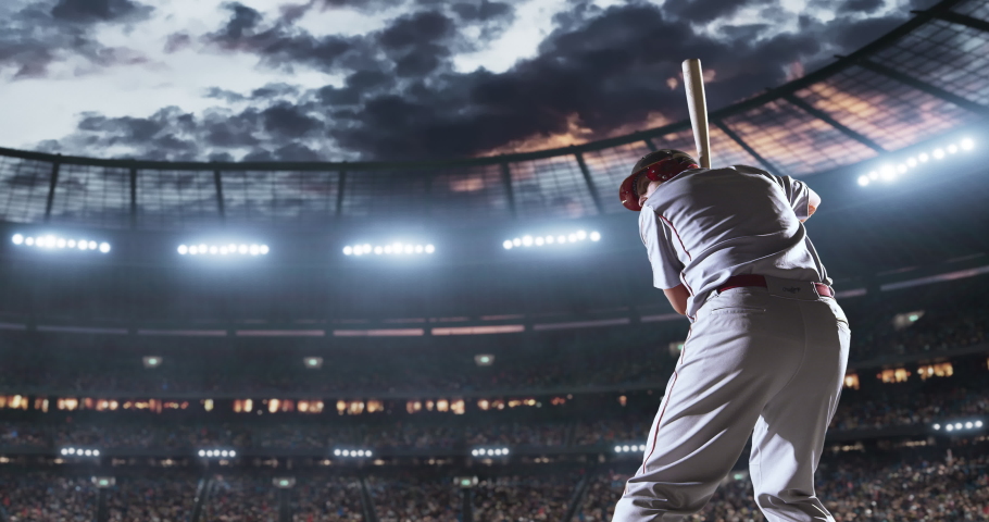 Baseball player in action on the professional stadium. The stadium is made in 3D with animated crowd. Royalty-Free Stock Footage #1054553075