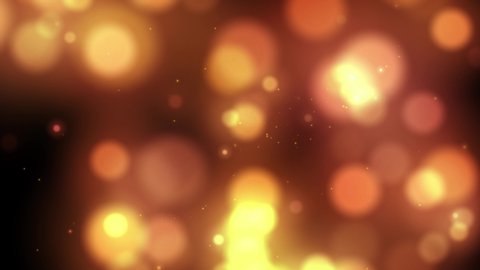 Colorful bokeh in motion design graphic on dark background. Abstract template with orange gradient glowing. Wind floating dynamical round decoration element. 4K Ultra HD 3840x2160 looped animation