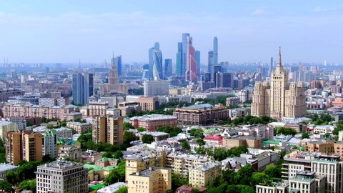 Moscow, Russia. Aerial panoramic view of the downtown, soviet high-rise buildings and Moscow city skyscrapers Drone flying over the amazing cityscape.
