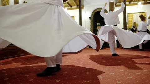 Bursa, Turkey - October 13, 2019: Semazen ceremony. Sufi whirling dervishes dances in Turkey. Sufi whirling is a form of physically active meditation