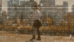 Animation of a busy young Caucasian professional man on the go in the city with office buildings with binary coding moving in the foreground - Powered by Shutterstock - Get 15% off with code: PIKWIZARD15